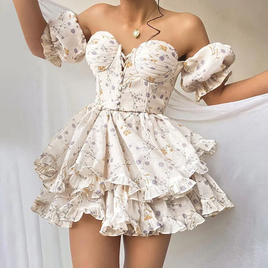 Nancy - Petite robe portefeuille à découpes florales