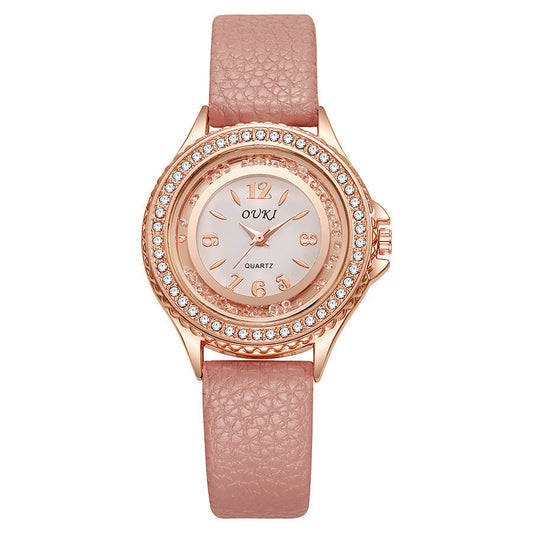 Montre femme ronde avec lunette en cristal