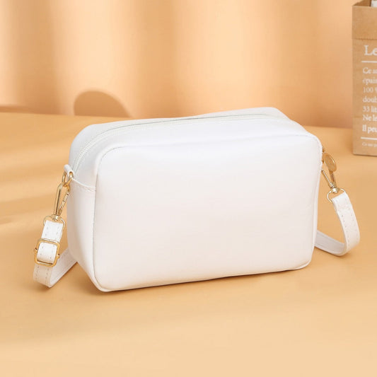 Sac à bandoulière en cuir synthétique pour femme au design minimaliste - Clara