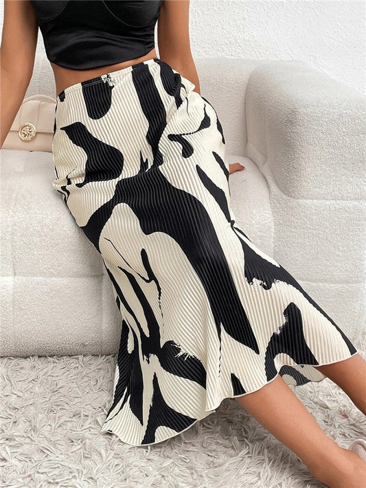 Jupe élégante aux plis fluides, parfaite pour un look raffiné et féminin en toute occasion.
