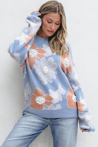 Blanche - Blauer Strickpullover mit Rundhalsausschnitt und Blumenmuster mit hängenden Schultern