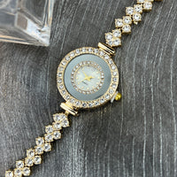 Montre-bracelet femme avec cadran rond et cristaux - Marvella