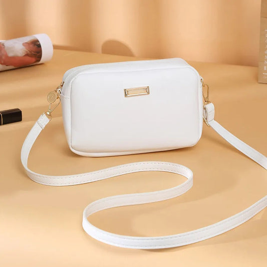 Sac à bandoulière en cuir synthétique pour femme au design minimaliste - Clara