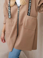 Moderner Kapuzenmantel für Frauen - Nelya