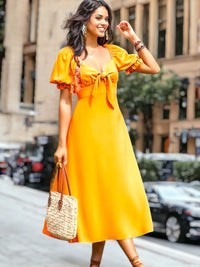 Selene - Robe midi à manches bouffantes
