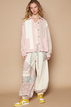 Armelle - Steppjacke mit Knöpfen, freiliegenden Nähten und Blumenmuster
