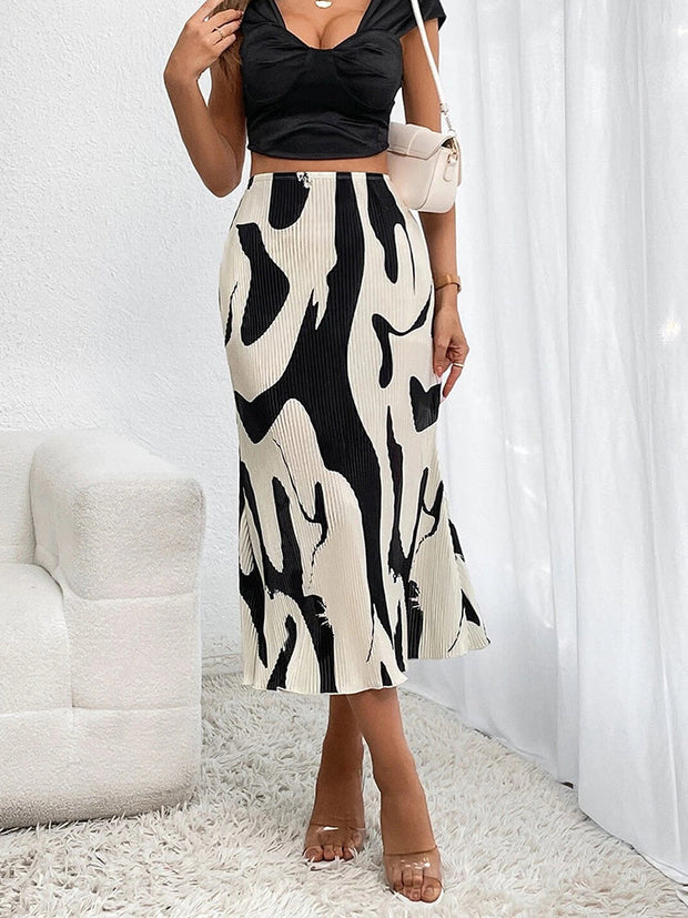 Jupe élégante aux plis fluides, parfaite pour un look raffiné et féminin en toute occasion.