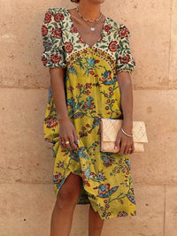Abida - Robe col V à manches bouffantes Multicolore