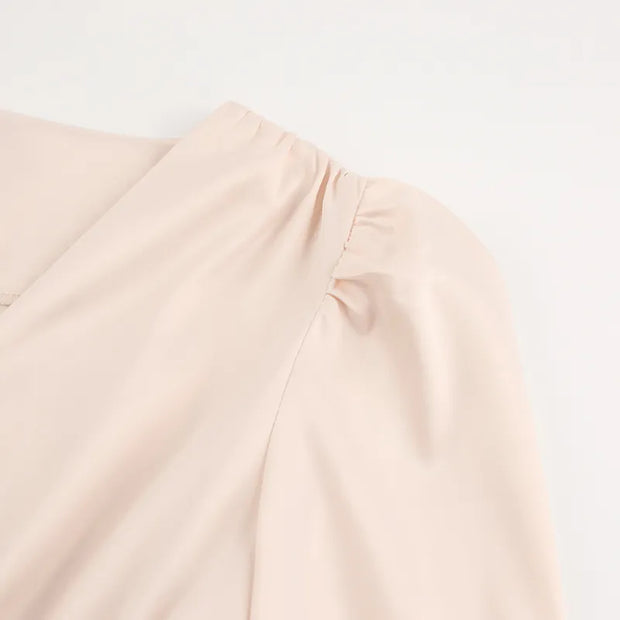 Jena - Robe minceur à la taille avec manches lanternes