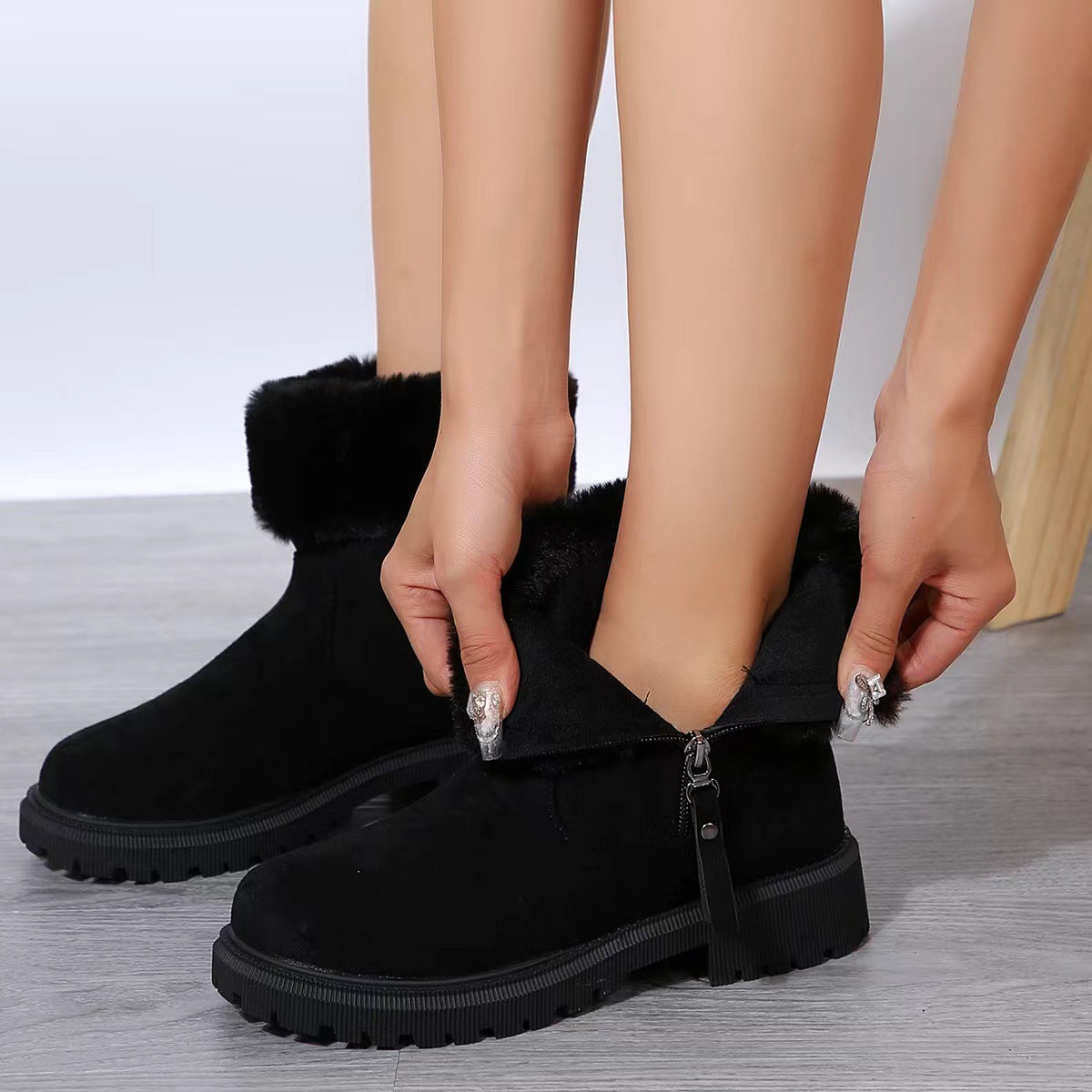 Winterliche Damenstiefeletten mit Plüschbesatz - Elinea