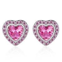 Boucles d'oreilles pour femmes avec un motif en forme de cœur et des détails étincelants
