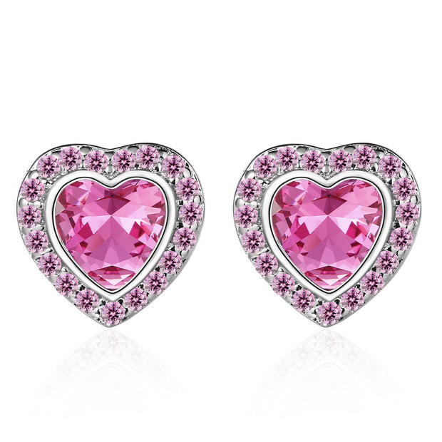 Boucles d'oreilles pour femmes avec un motif en forme de cœur et des détails étincelants