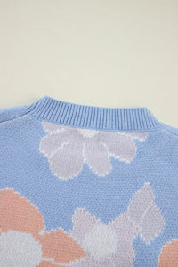 Blanche - Blauer Strickpullover mit Rundhalsausschnitt und Blumenmuster mit hängenden Schultern