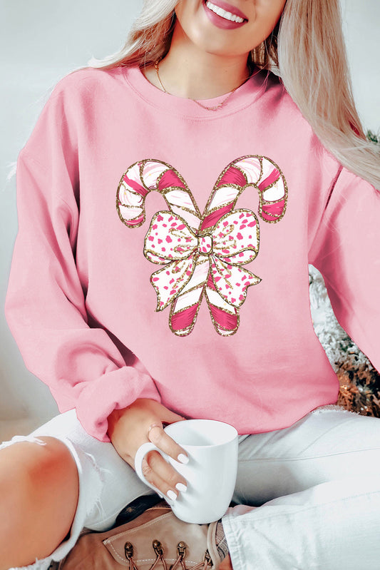 Claire - Sweatshirt Épaules Tombantes à Graphisme de Noël et Nœud Rose