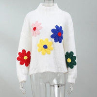 Farah - Grobstrickpullover mit auffälligen Blumen-Applikationen