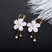 Boucles d'oreilles fleurs lilas