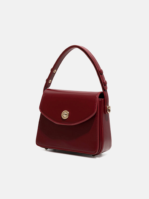 Sac à main pour femme avec rabat et finition élégante