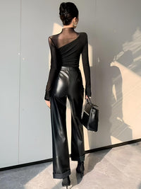 Layla - T-shirt asymétrique à empiècements en maille transparente