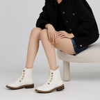Stiefeletten mit goldener Knopfleiste - Enorie