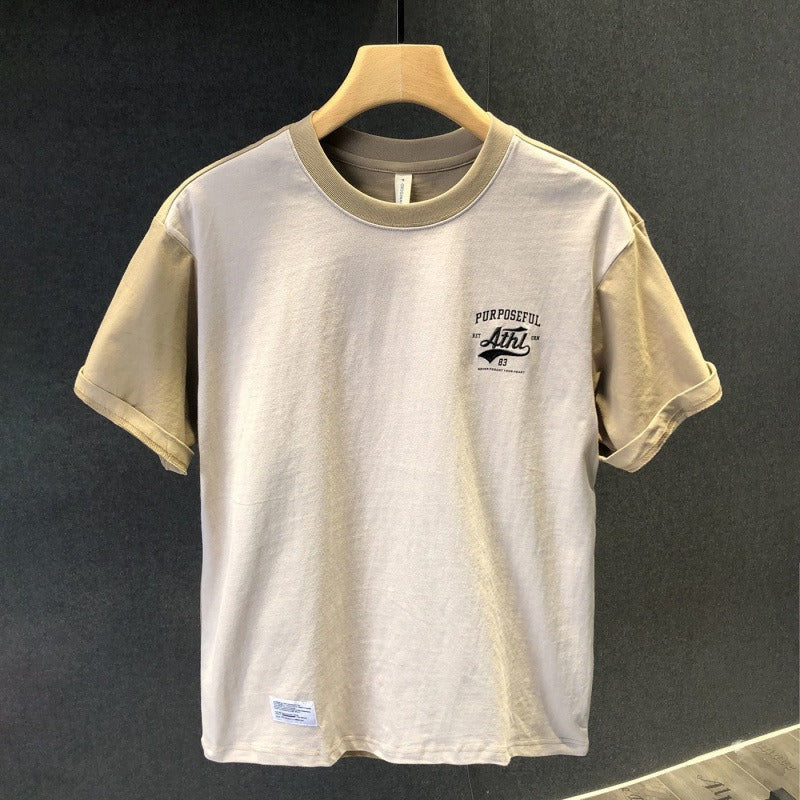 Basic-T-Shirt aus Baumwolle mit minimalistischem Aufdruck im urbanen Stil - Damián