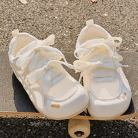 Damen-Turnschuhe mit Kreuzriemen - Alana