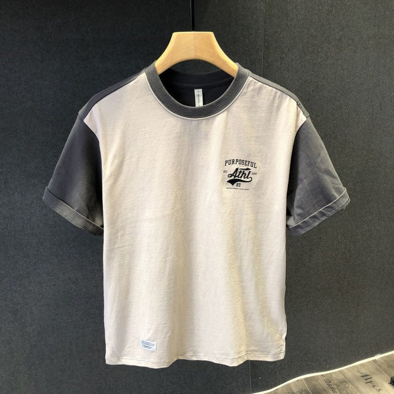 Basic-T-Shirt aus Baumwolle mit minimalistischem Aufdruck im urbanen Stil - Damián