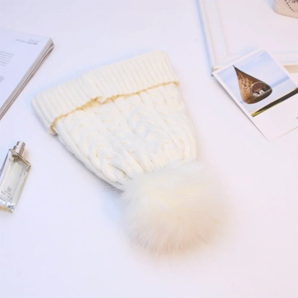 Damenstrickmütze mit Fleecefutter und Bommel - Sauly