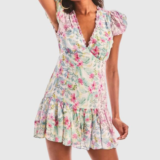 Kimberly - Floral flounce dress with flutter sleeves