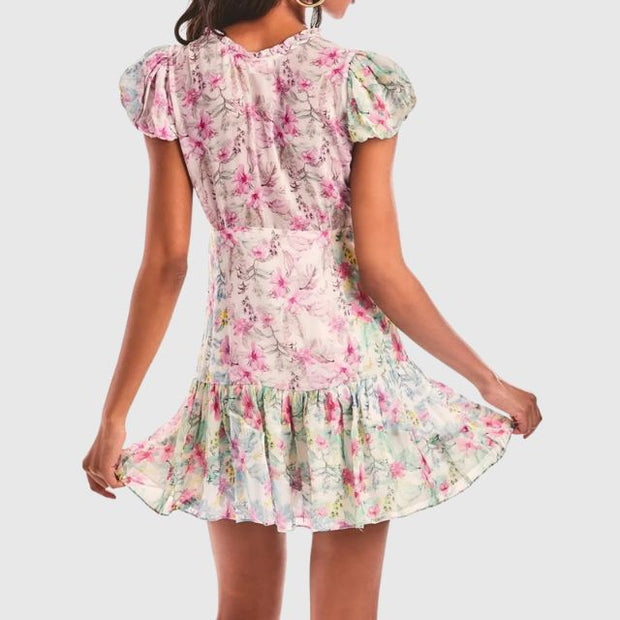 Kimberly - Floral flounce dress with flutter sleeves