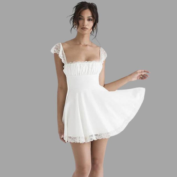 Evelina - Robe avec garniture en dentelle et jupe fluide