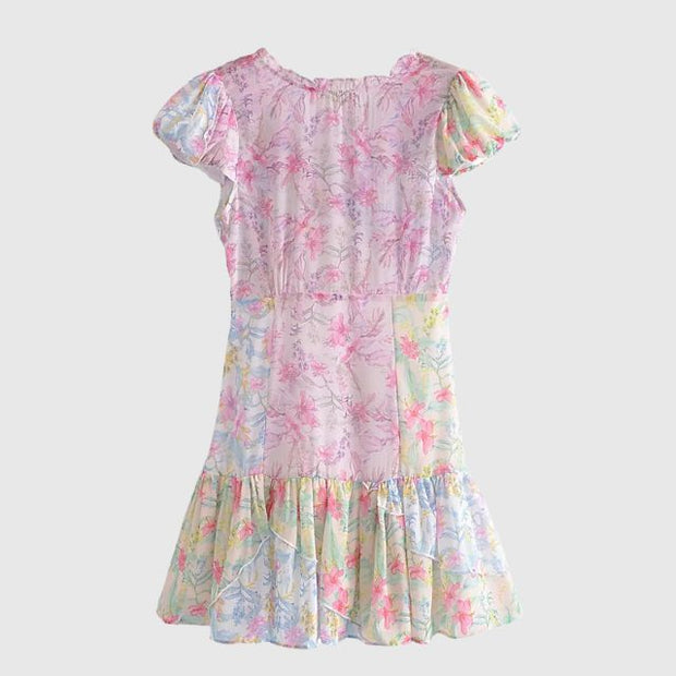 Kimberly - Floral flounce dress with flutter sleeves