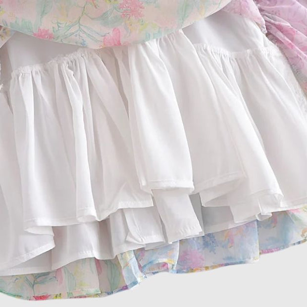 Kimberly - Floral flounce dress with flutter sleeves