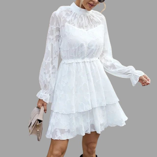 Rosella - Mini-robe fluide à volants avec détails floraux gaufrés