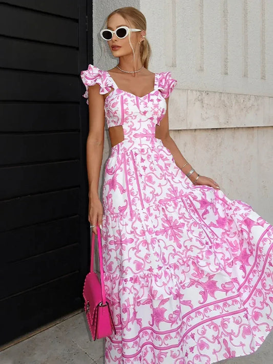 Sally - Longue robe rose à imprimé floral