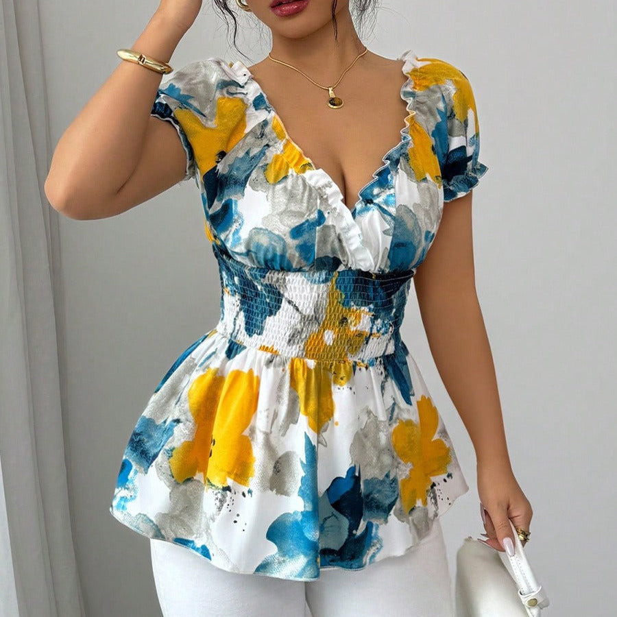 Damenbluse mit tiefem Ausschnitt mit Blumendruck und Schößchen - Yelina