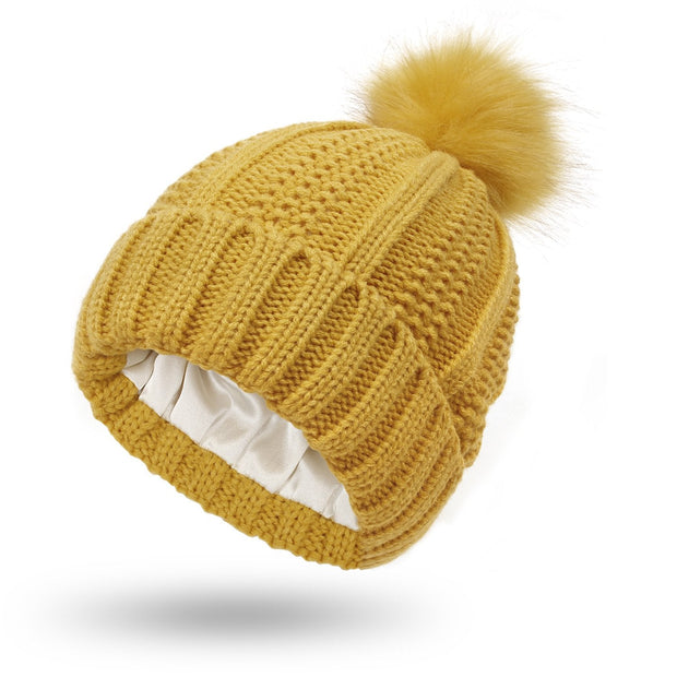 Damenstrickmütze mit Bommel - Daitonna
