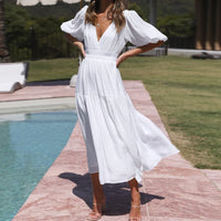 Kelly - Robe élégante avec décolleté en V et manches bouffantes