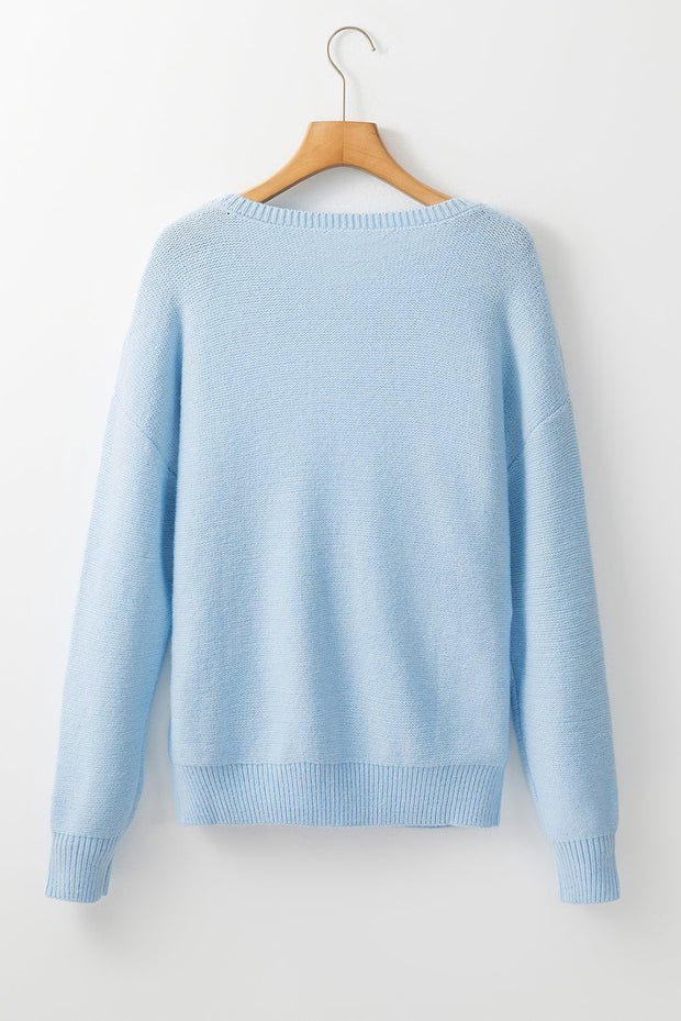 Anne - Strickpullover mit Blumenmuster und gerippten Kanten