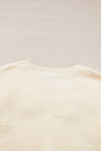 Anne - Strickpullover mit Blumenmuster und gerippten Kanten