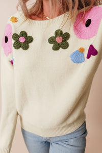 Anne - Strickpullover mit Blumenmuster und gerippten Kanten