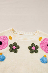 Anne - Strickpullover mit Blumenmuster und gerippten Kanten