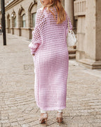 Strickjacke mit Taschen in Ausschnittform und längerer Länge