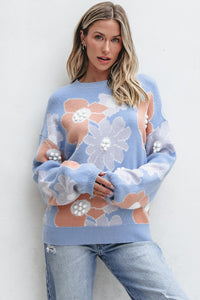 Blanche - Blauer Strickpullover mit Rundhalsausschnitt und Blumenmuster mit hängenden Schultern