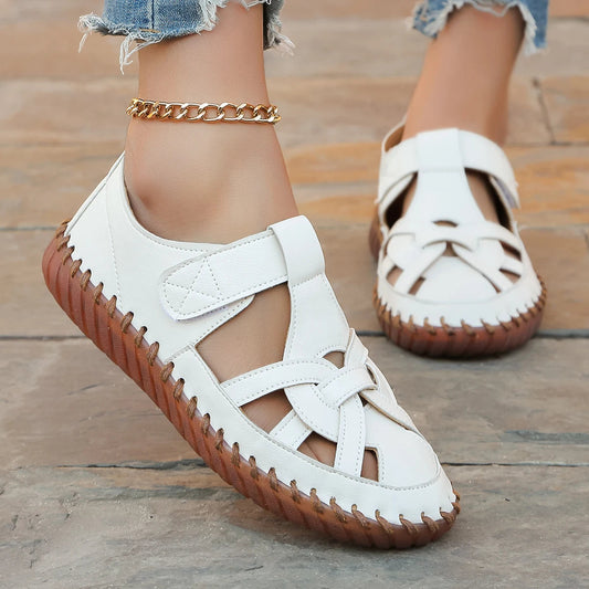 Chaussures plates de style mocassin ajouré en cuir blanc pour femme - Anelya