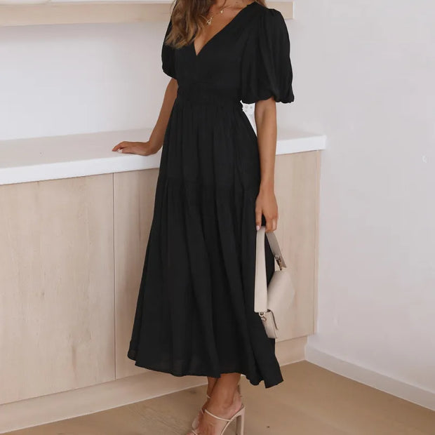Kelly - Robe élégante avec décolleté en V et manches bouffantes
