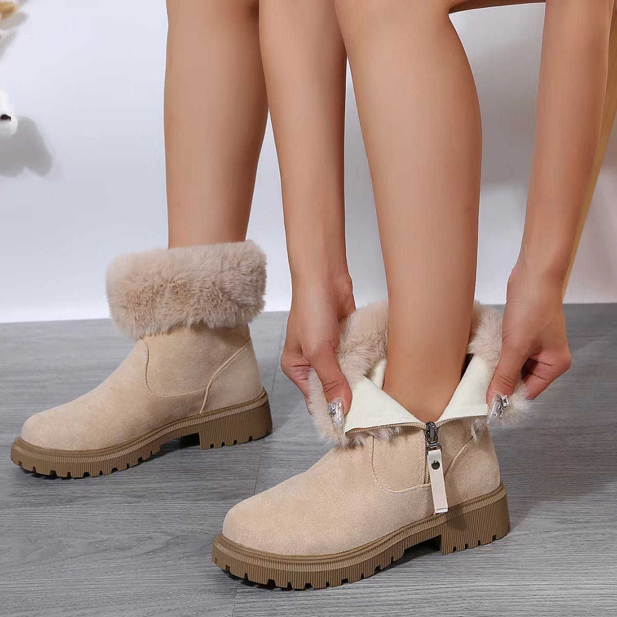 Winterliche Damenstiefeletten mit Plüschbesatz - Elinea