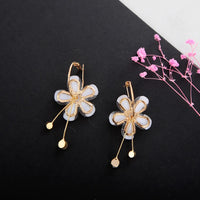 Boucles d'oreilles fleurs lilas