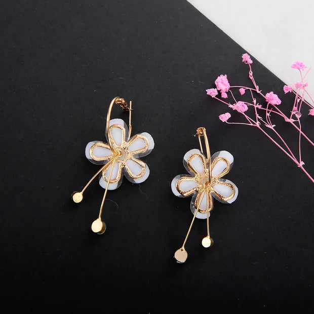 Boucles d'oreilles fleurs lilas