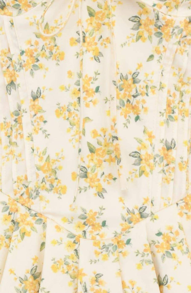 Emily - Mini robe corsetée avec col en V Robe corsetée à fleurs