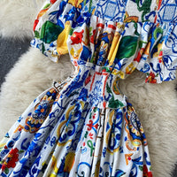 Robe féminine décolletée à manches bouffantes de style bohème - Marisol